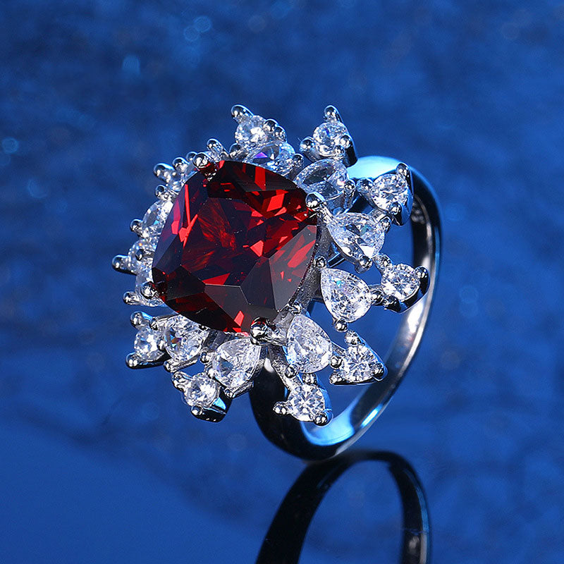 Oval Red Garnet & Diamond Halo Cocktail Ring