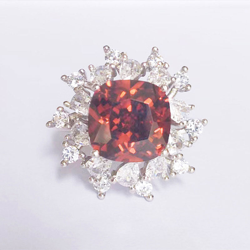 Oval Red Garnet & Diamond Halo Cocktail Ring